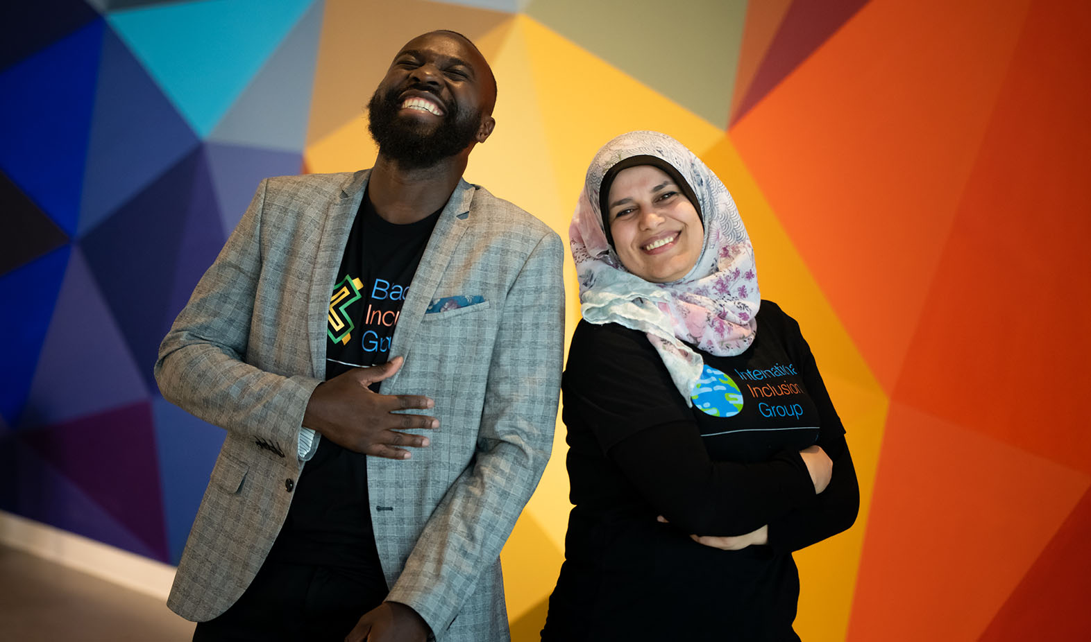 Two Inclusion Group leaders laughing